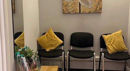 Inviting waiting area at V Fritz Lymphatic Drainage Specialist in London, GB with chairs and art.