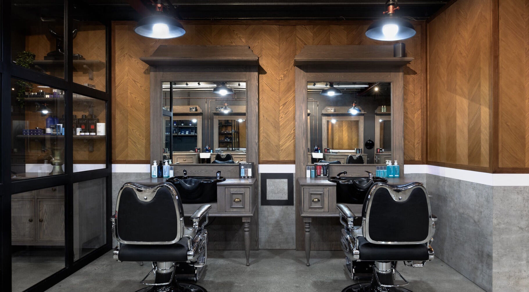 Stylish interior of Davilia Barbershop Karrinyup, featuring sleek chairs and mirrors in Karrinyup, Western Australia, AU.