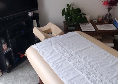 Massage table setup at Thrive Therapy & Fitness, Peterborough, England, GB, inviting calm and relaxation.