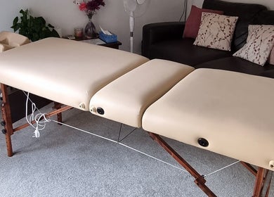 Massage table setup at Thrive Therapy & Fitness, Peterborough, England, GB ready for wellness sessions.