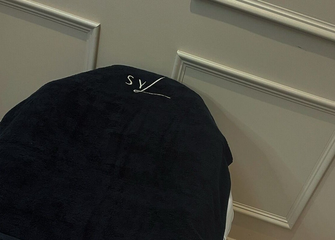 Comfortable treatment table at See You Laser, Havant, England, GB, ready for a relaxing beauty session.