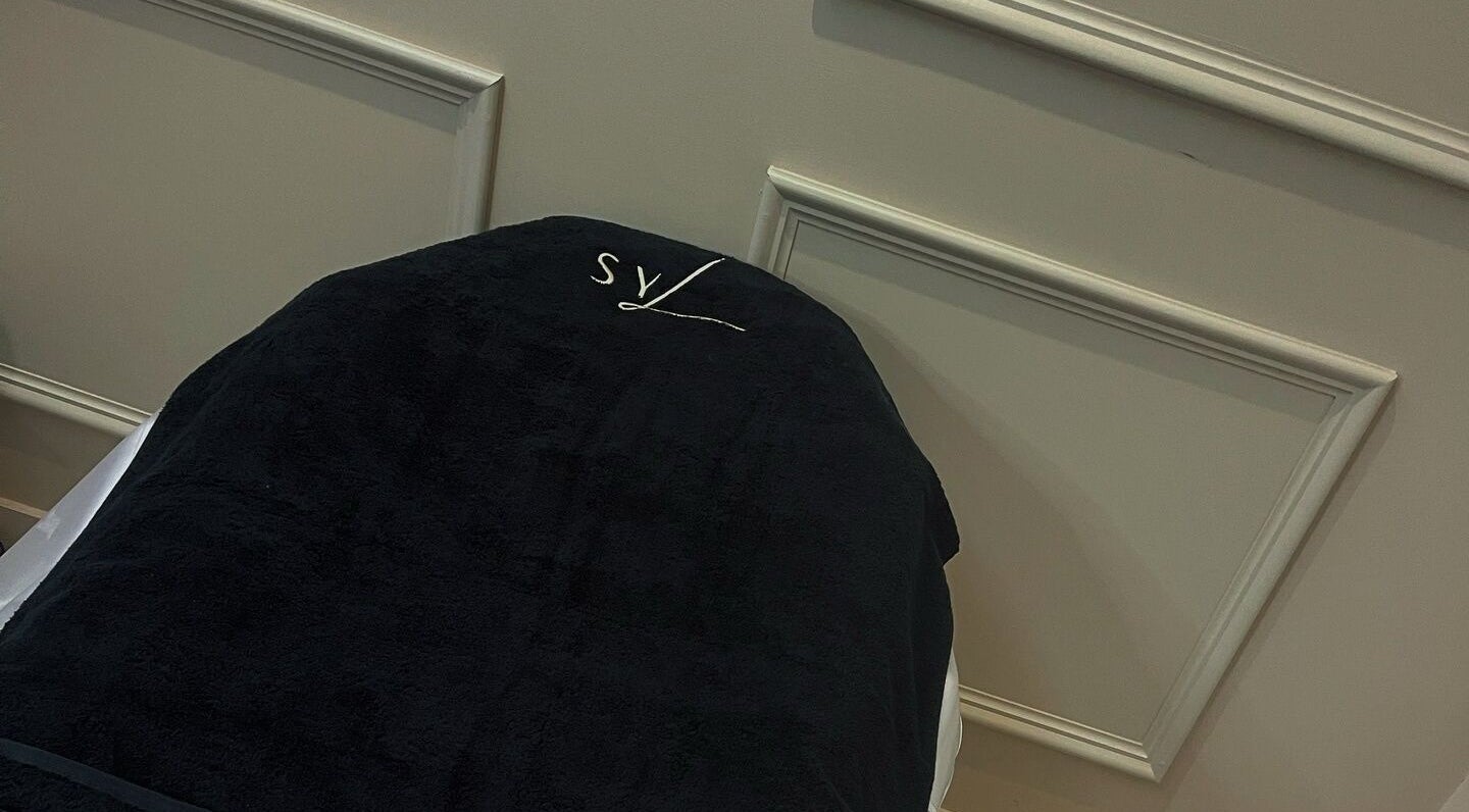 Comfortable treatment table at See You Laser, Havant, England, GB, ready for a relaxing beauty session.