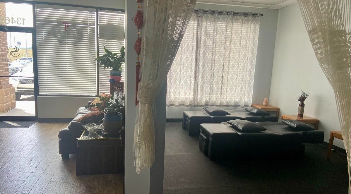 Revive Asian Massage lobby with serene seating in Overland Park, Kansas, US.