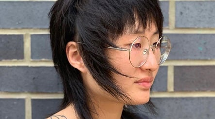 Modern mullet hairstyle at Chrissy Hutton Hair, London, England, GB. A perfect blend of classic and contemporary.