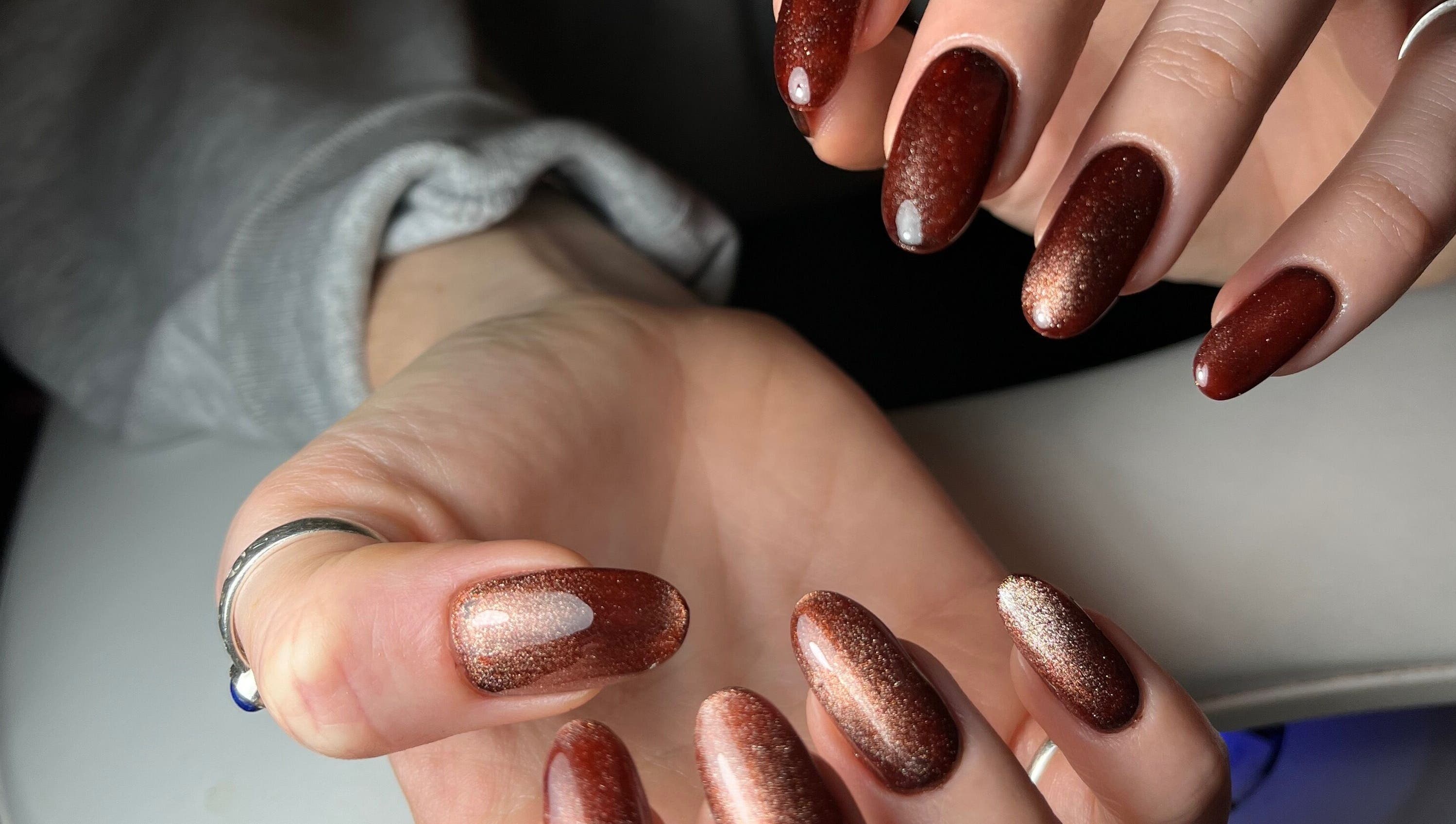 Elegant bronze manicure done at Pooch 1 Creates, Bristol, England, GB. Perfect for beauty and style.