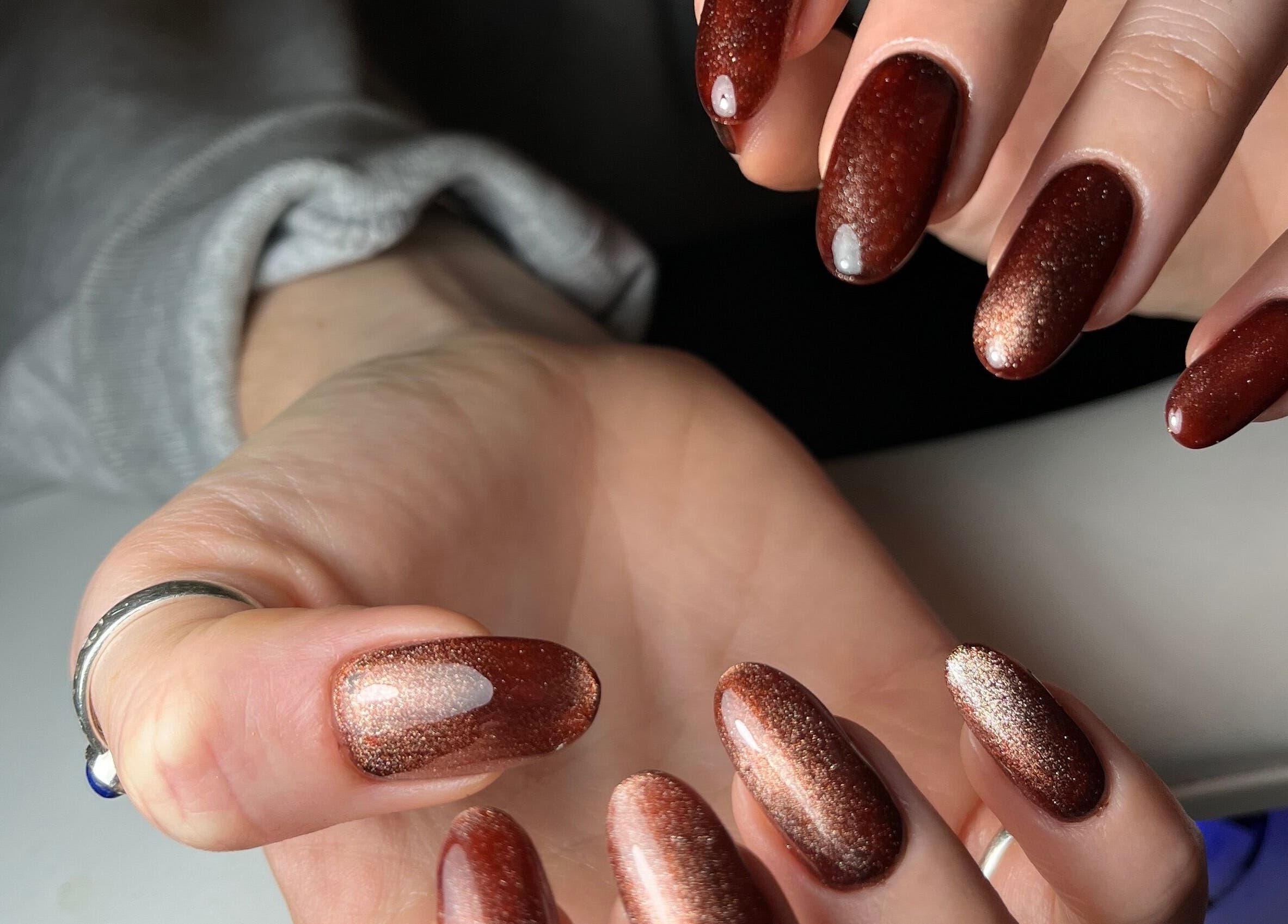 Elegant bronze manicure done at Pooch 1 Creates, Bristol, England, GB. Perfect for beauty and style.