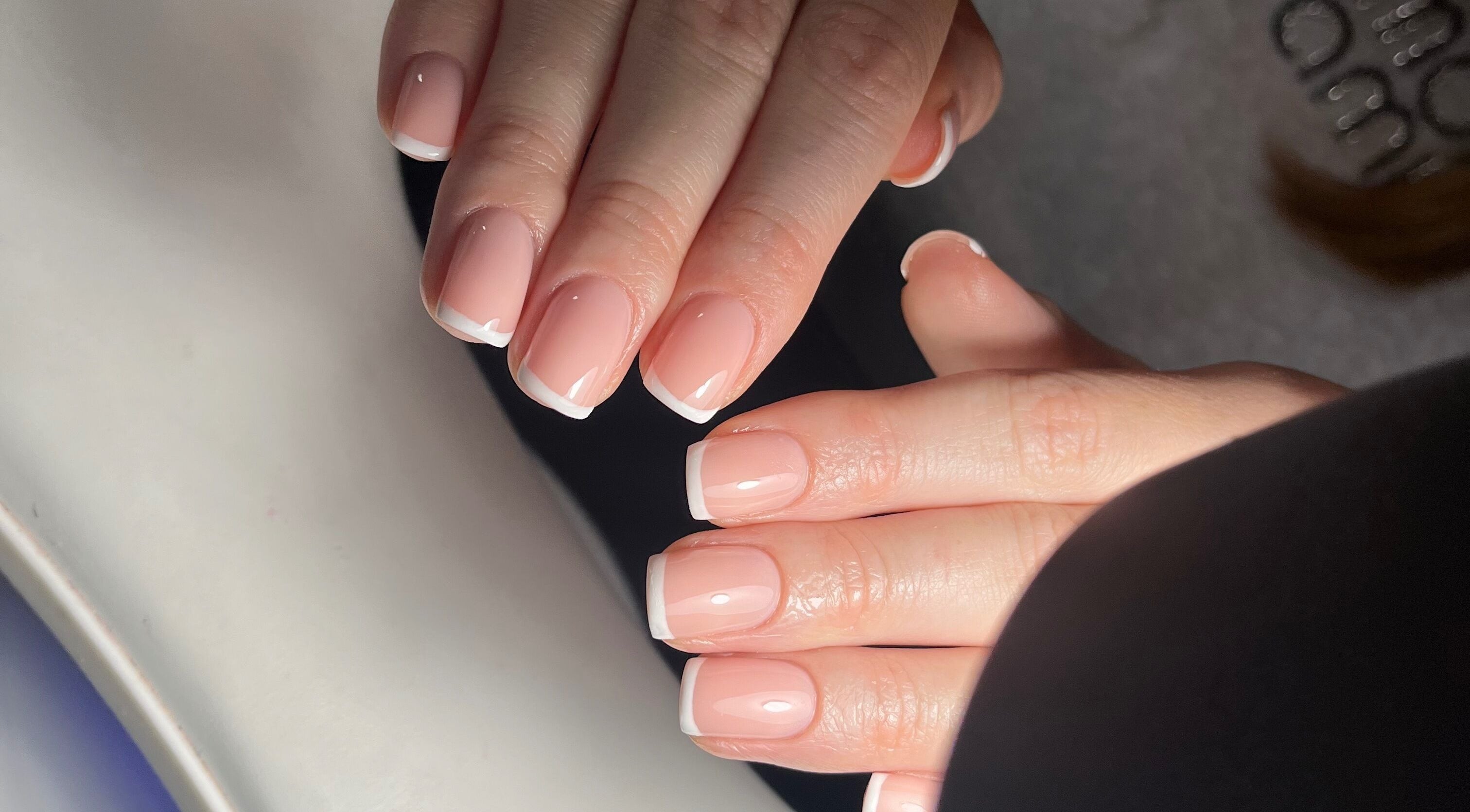 French manicure at Pooch 1 Creates, Bristol, England, GB. Polished nails with white tips.