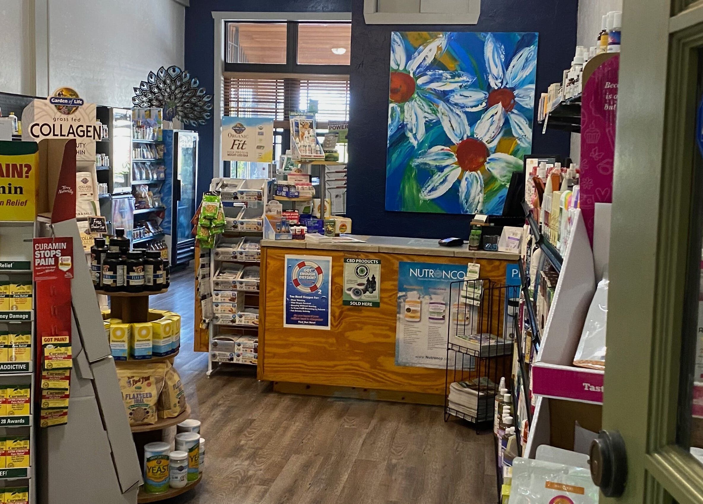 Inside Joanne's Nutrition World showcasing health products in Fort Pierce, Florida, US.