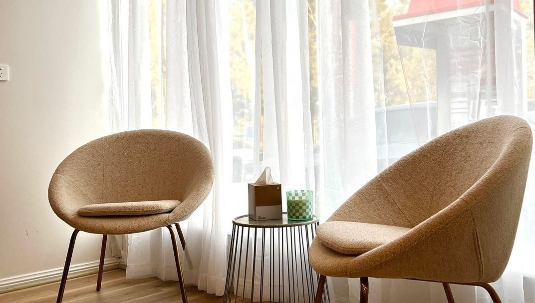 Chic waiting area with modern chairs at Charli James Hair and Co THE OAKS, The Oaks, New South Wales, AU.