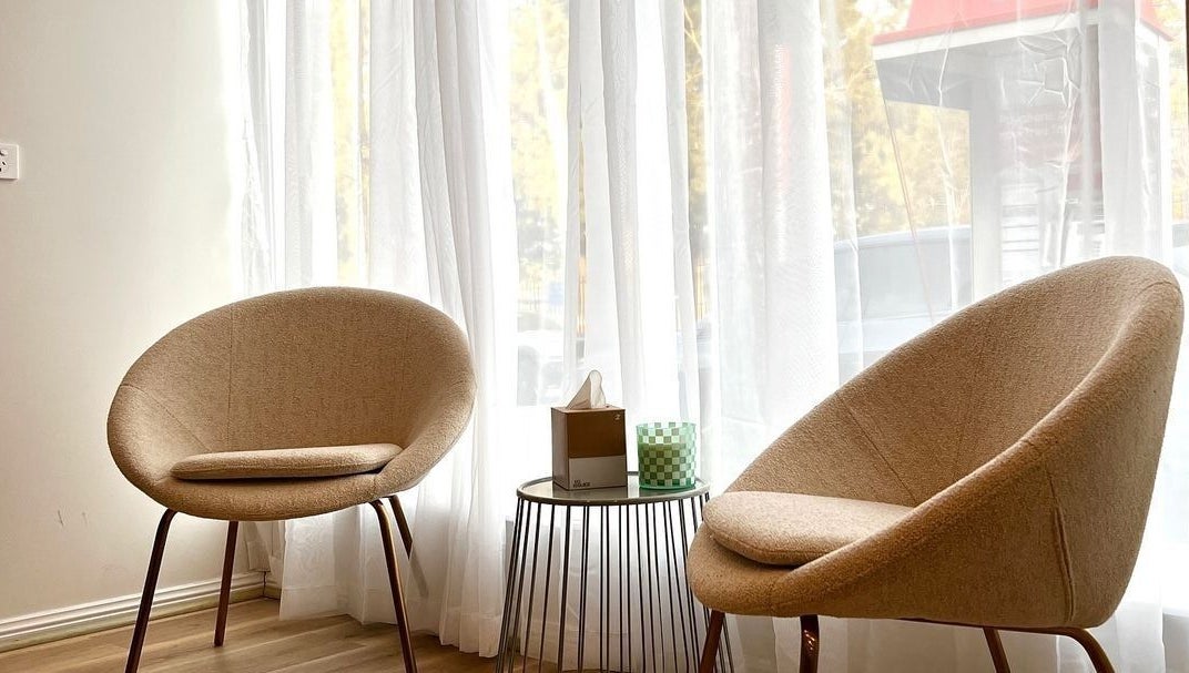 Chic waiting area with modern chairs at Charli James Hair and Co THE OAKS, The Oaks, New South Wales, AU.