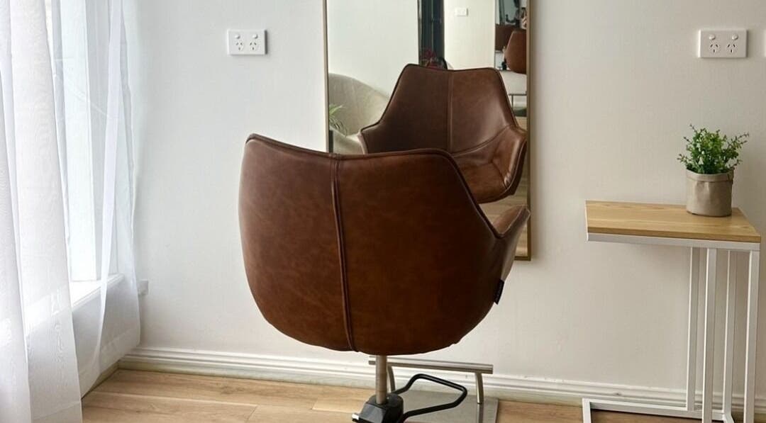 Stylish salon chair at Charli James Hair and Co THE OAKS, The Oaks, New South Wales, AU.