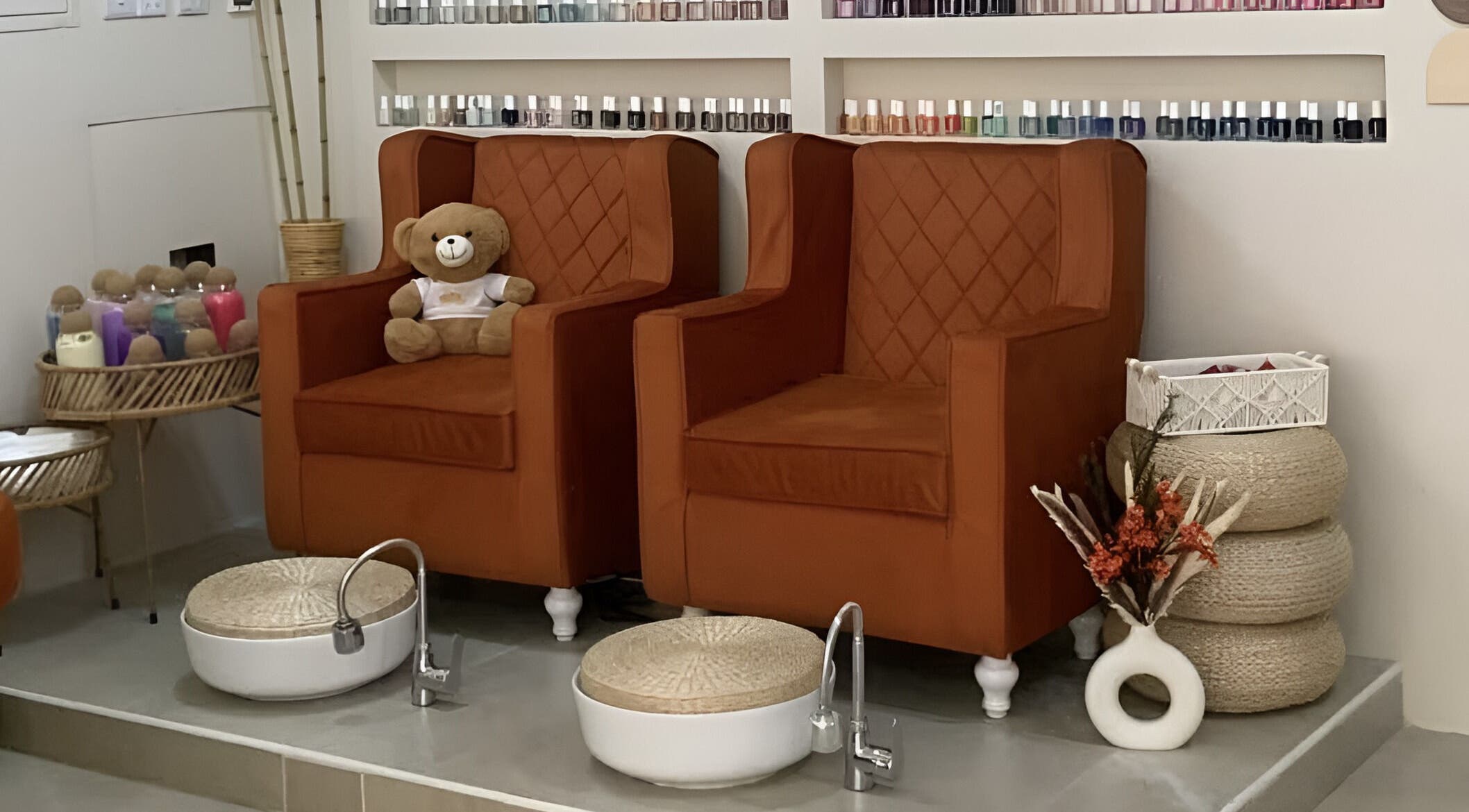 Plush seating and pedicure setup at The Luxurious Lash Salon in Sharjah, Sharjah, AE.