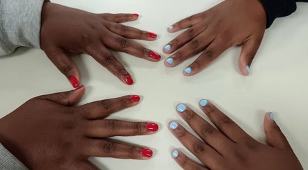 Stylish red and blue nails at Kime Salon - Nails Hair and Beauty, Roodepoort, Gauteng, ZA.