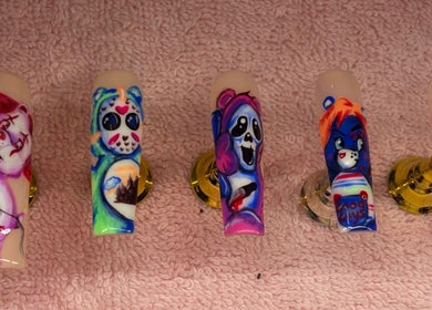 Colorful artistic cartoon nail art designs at Lanny King, High Melton, England, GB. Vibrant and creative.