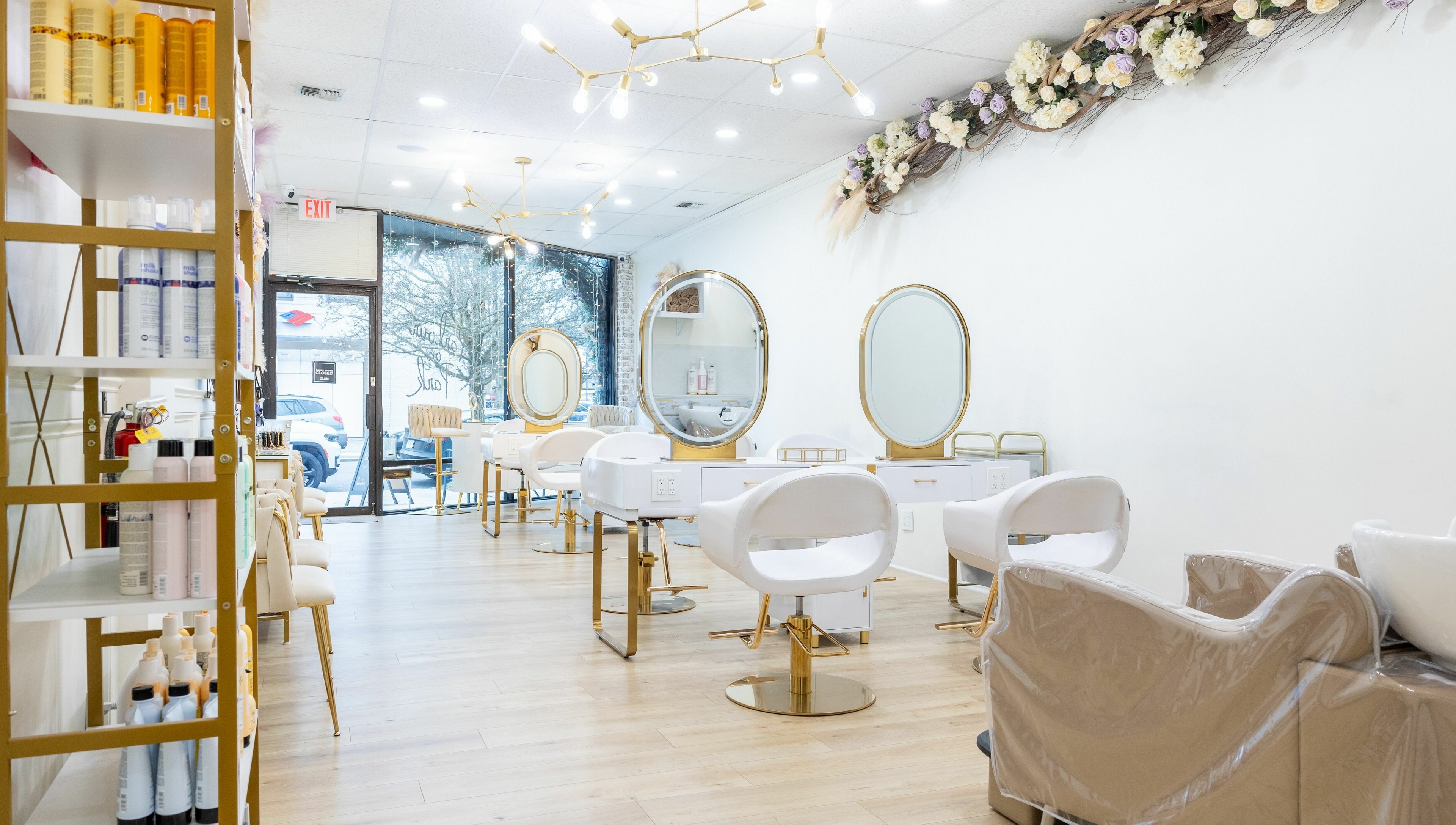 Elegant interior of Parlour On Park in Wantagh, New York, US with stylish beauty stations and decor.