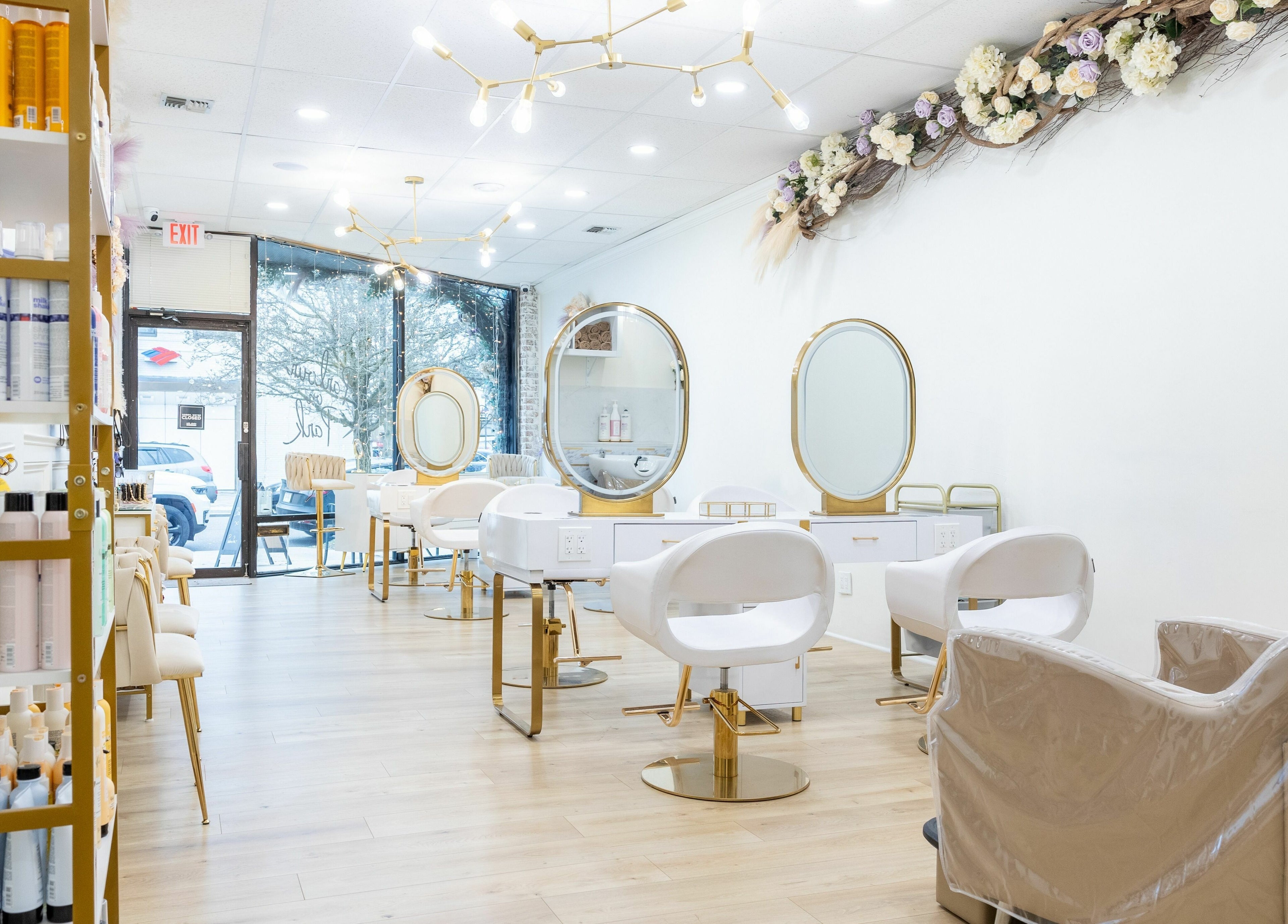 Elegant interior of Parlour On Park in Wantagh, New York, US with stylish beauty stations and decor.