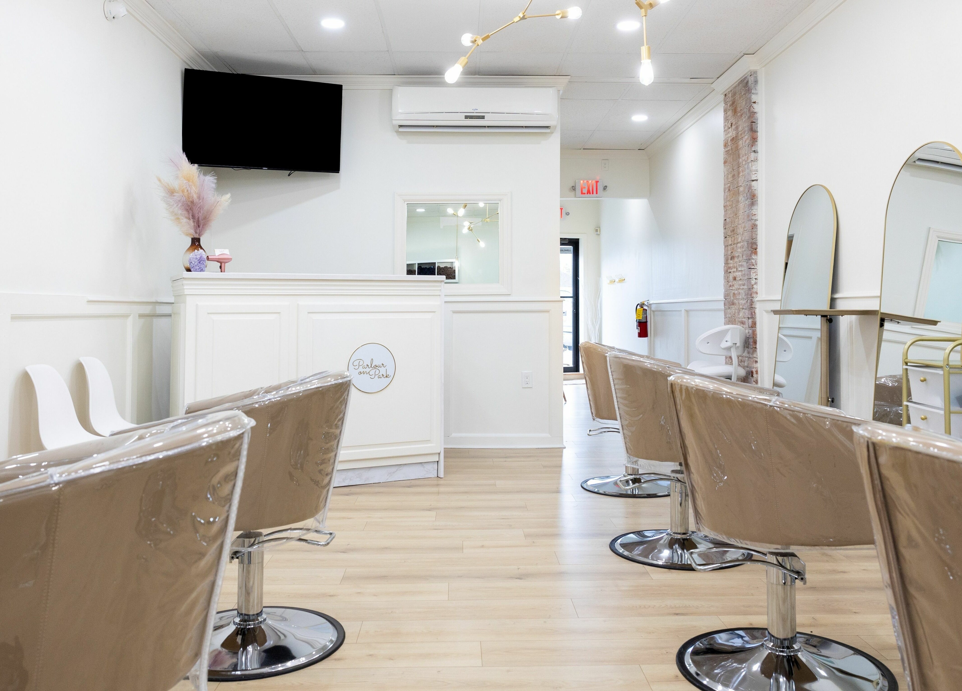 Elegant interior of Parlour On Park, Wantagh, New York, US with stylish chairs and decor.