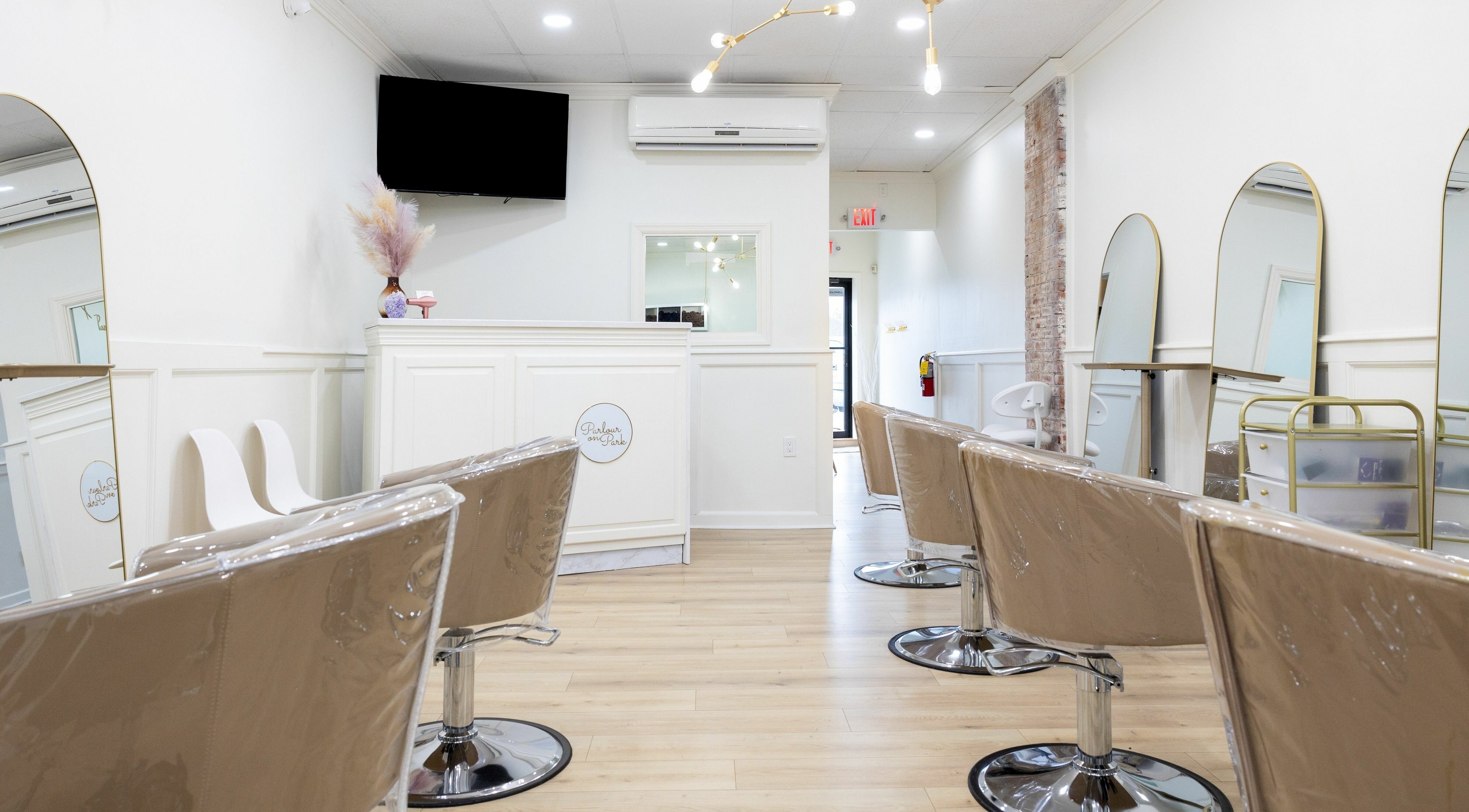 Elegant interior of Parlour On Park, Wantagh, New York, US with stylish chairs and decor.