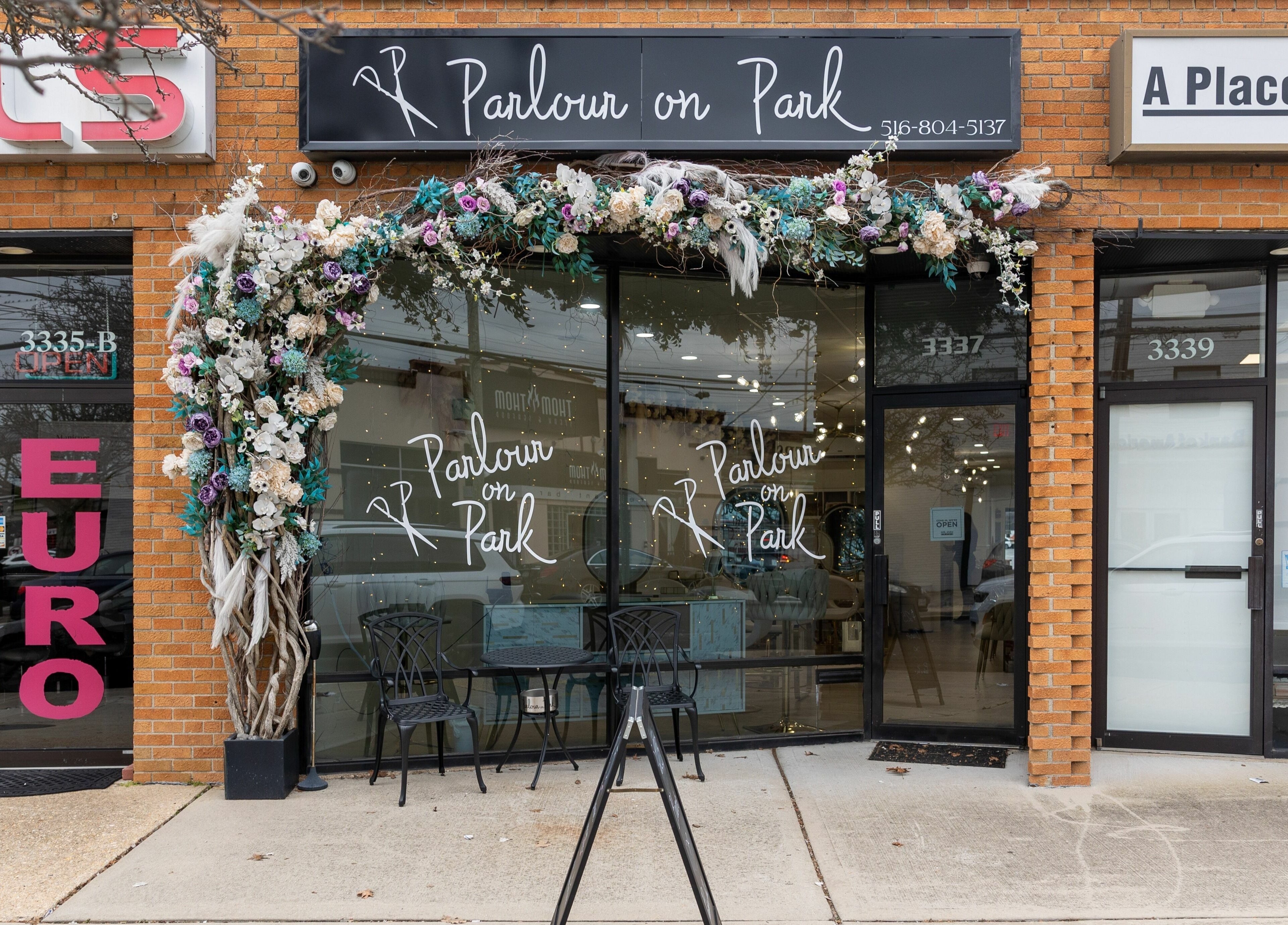 Exterior of Parlour On Park in Wantagh, New York, US, featuring a floral adorned entrance.