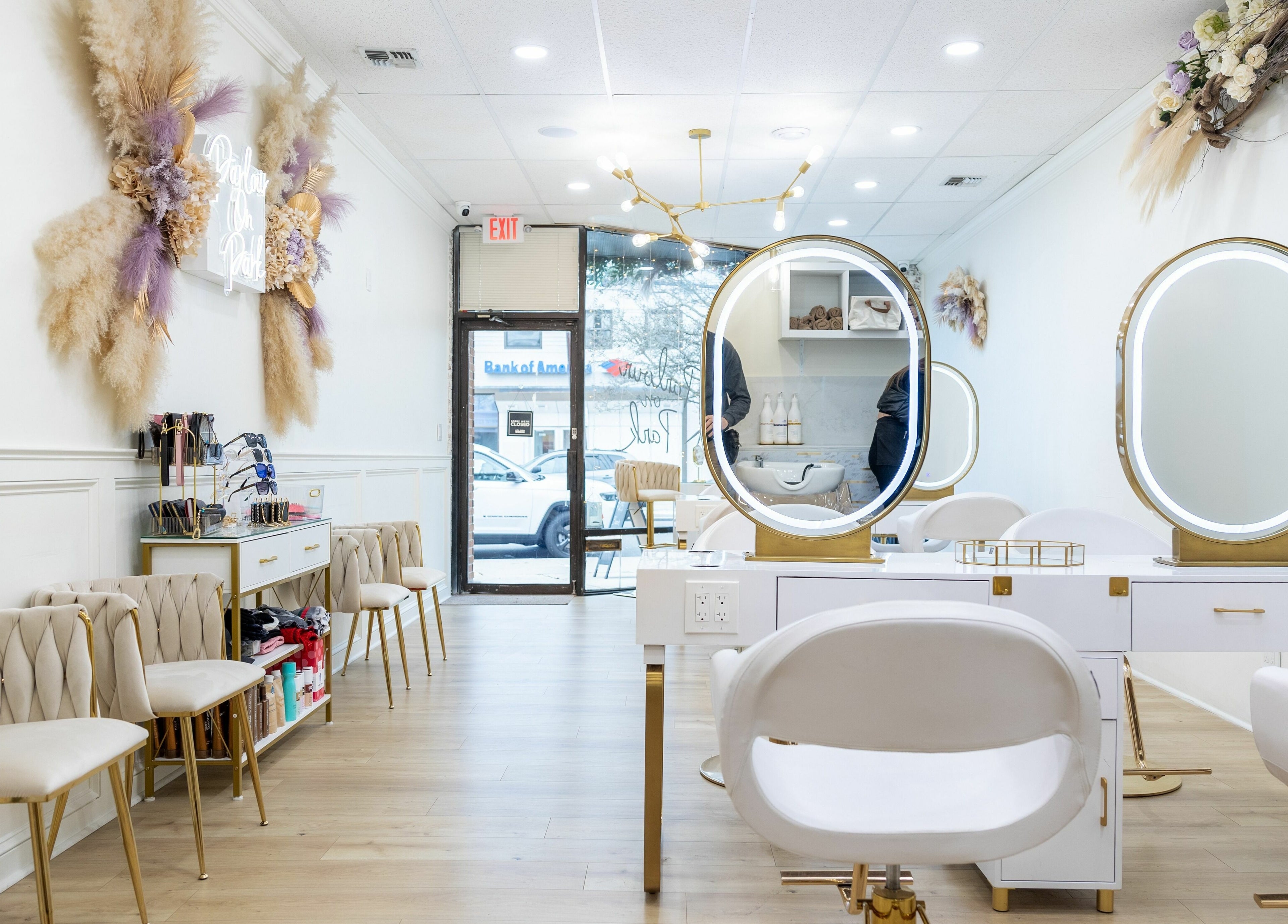 Modern interior of Parlour On Park in Wantagh, New York, US, featuring chic decor and styling stations.