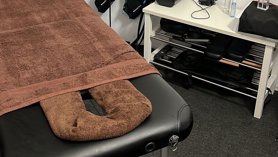 Cozy massage table at Massage to go by Thea, Attard, MT offers a serene ambiance for a relaxing experience.