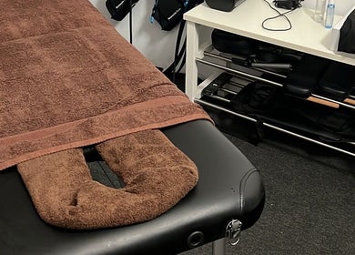 Cozy massage table at Massage to go by Thea, Attard, MT offers a serene ambiance for a relaxing experience.