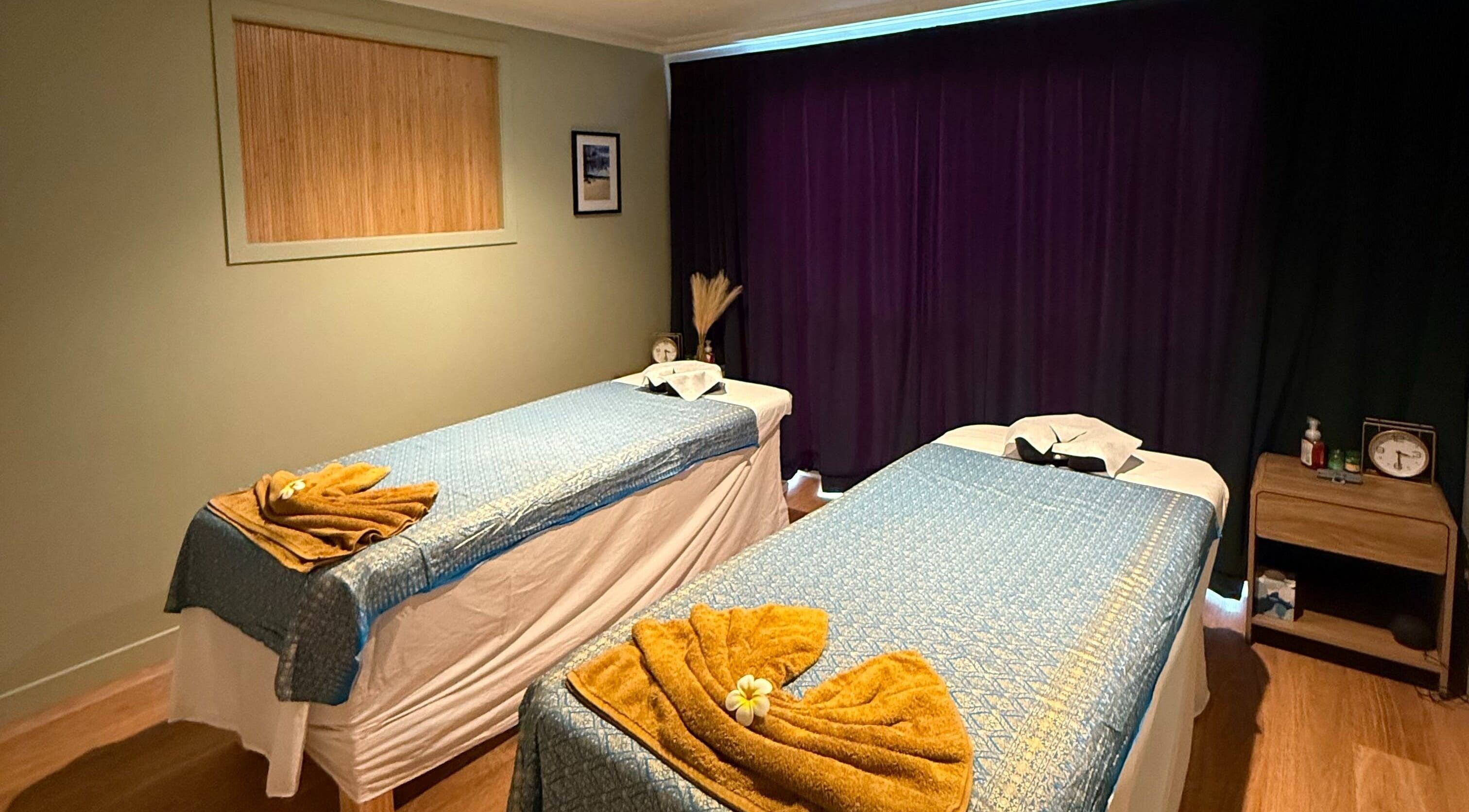 Relaxing massage room at Pure Massage - Greytown, Greytown, Wellington Region, NZ with two beds and calming decor.