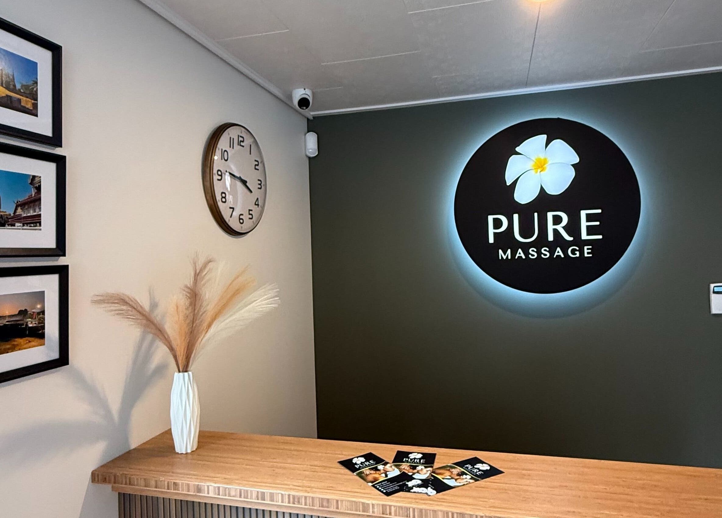 Welcome desk at Pure Massage - Greytown, featuring elegant decor and logo in Greytown, Wellington Region, NZ.