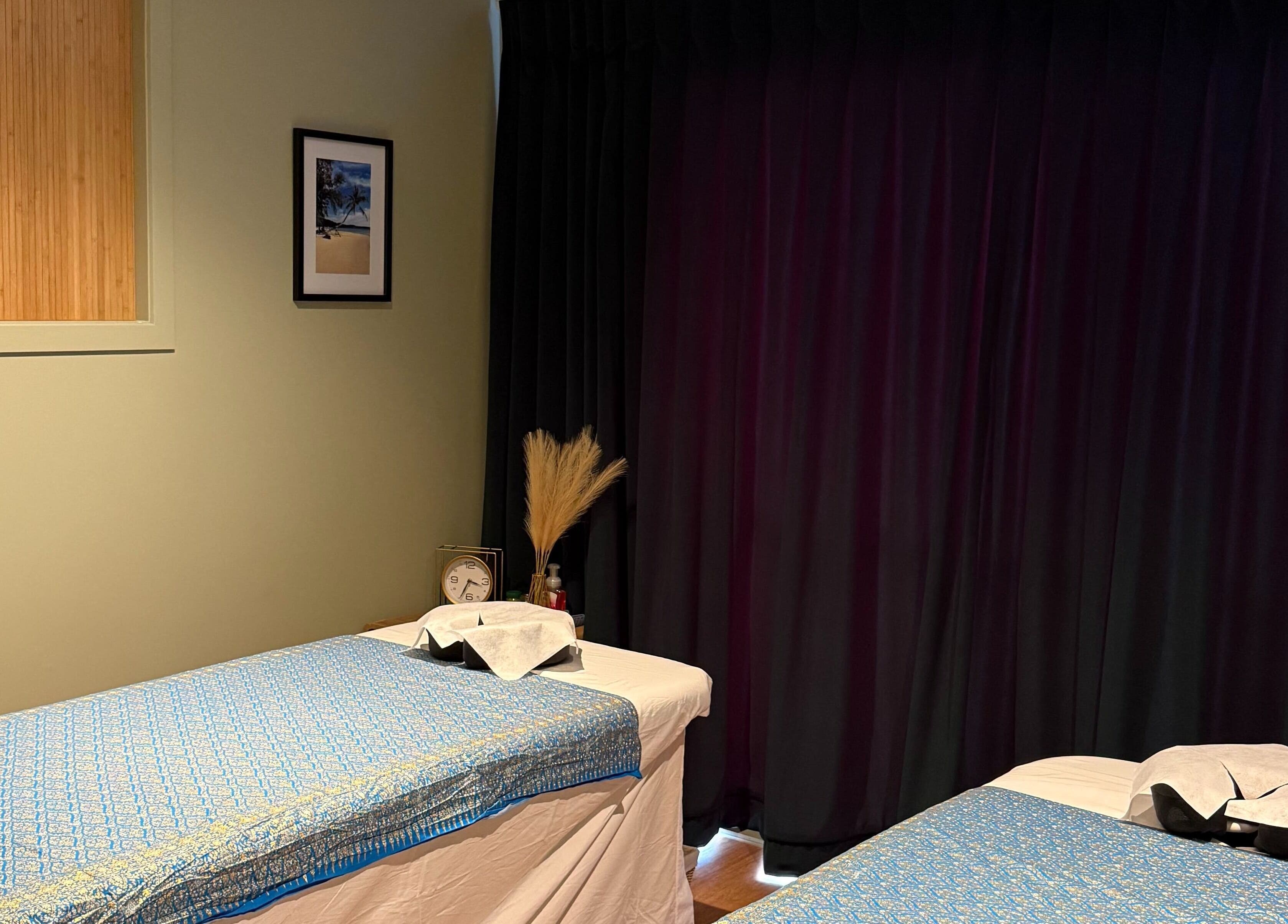 Relaxing massage room at Pure Massage - Greytown with twin tables in Greytown, Wellington Region, NZ.