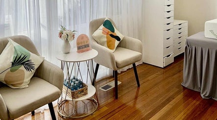 Inviting seating area at Studio Nail and Lashes, Melbourne, Victoria, AU. Modern chairs and decor.