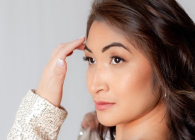 Model with styled hair at Glitz and Tanned Co, Fort St. John, British Columbia, CA.