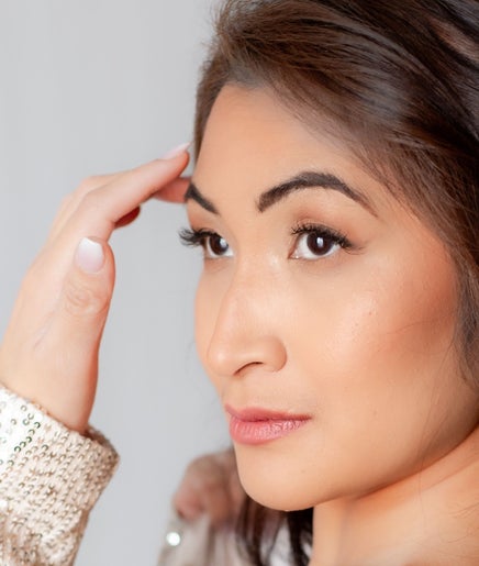 Model with styled hair at Glitz and Tanned Co, Fort St. John, British Columbia, CA.