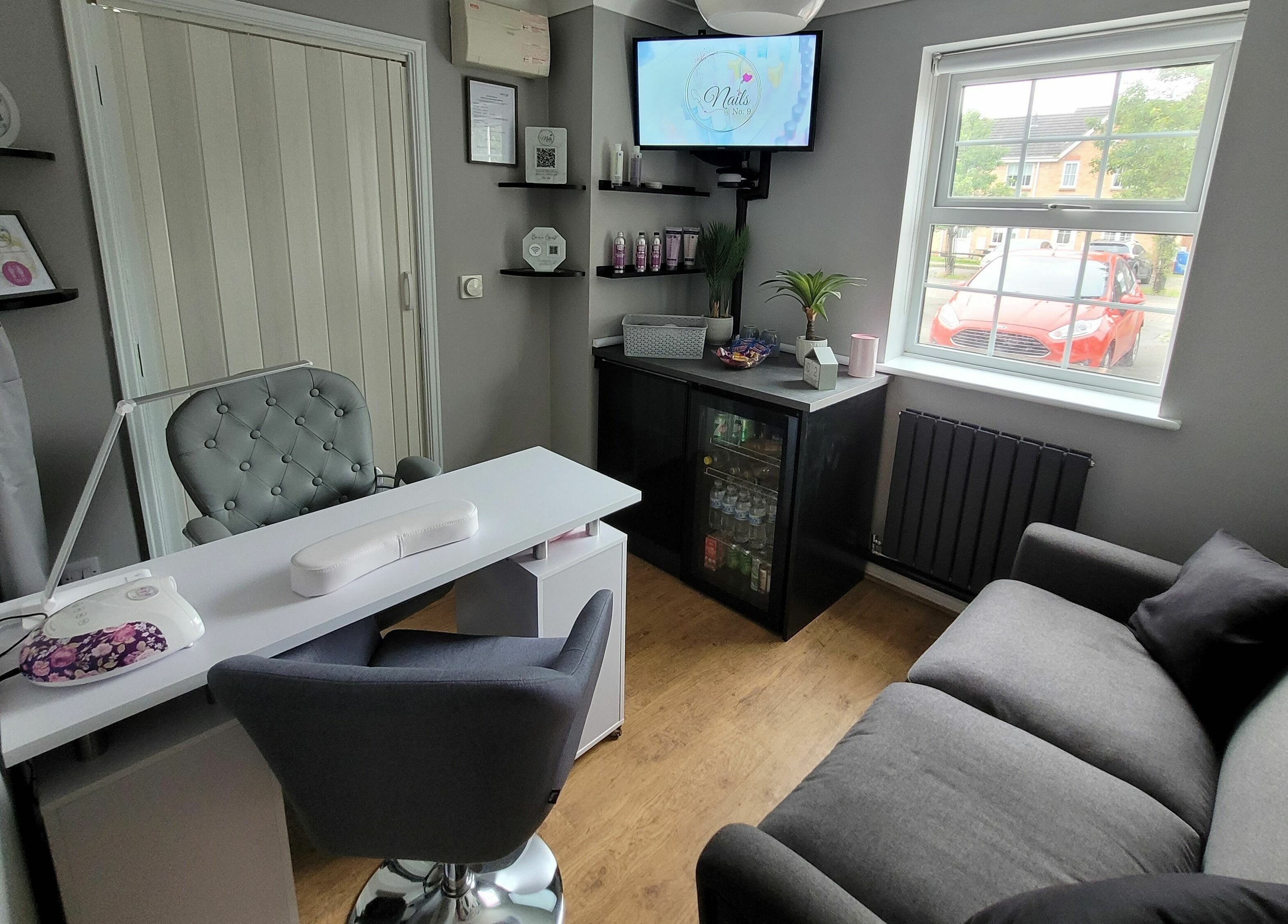 Elegant nail salon interior at Nails at No. 9, Brough, England, GB with a stylish nail desk and plush seating.