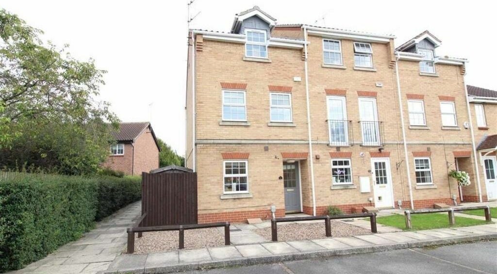 Charming brick building housing Nails at No. 9, located in Brough, England, GB, offering beauty and wellness services.