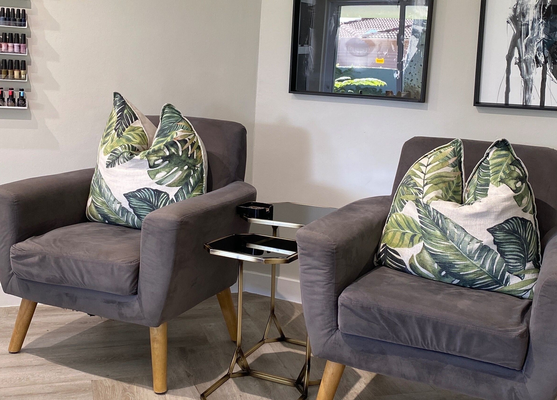 Comfortable seating area with stylish pillows at DASH, Johannesburg, Gauteng, ZA.