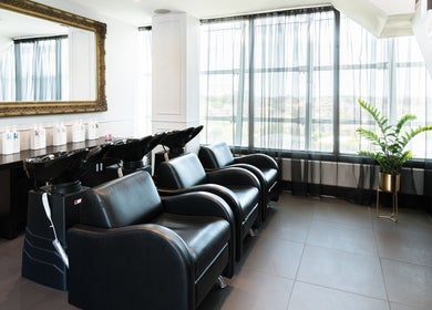 Elegant salon chairs and mirrors at Vescada Hair and Beauty, Bella Vista, New South Wales, AU.