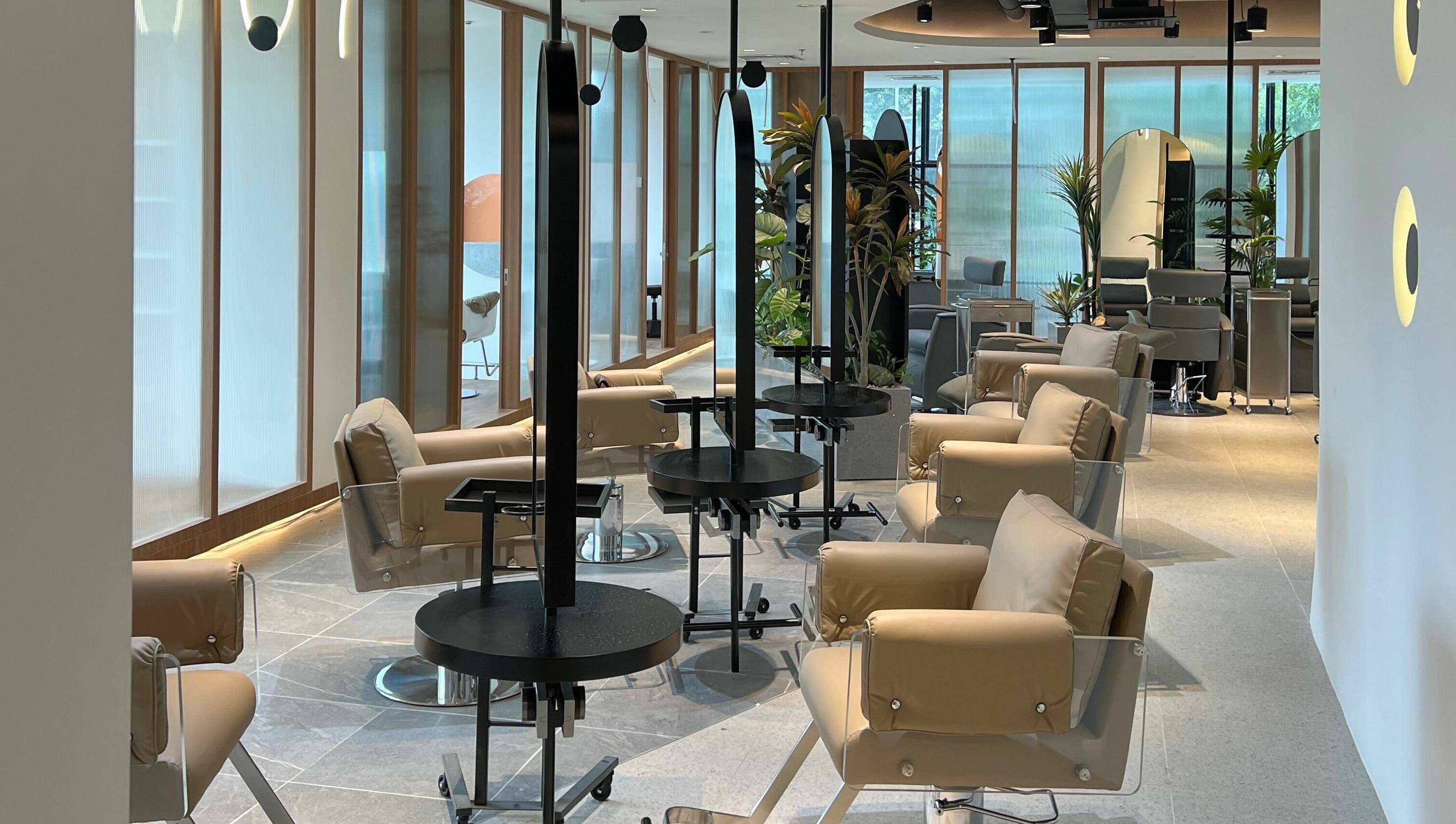 Chic and modern salon interior at Hair Library, Petaling Jaya, Selangor, MY, offering a tranquil ambiance.