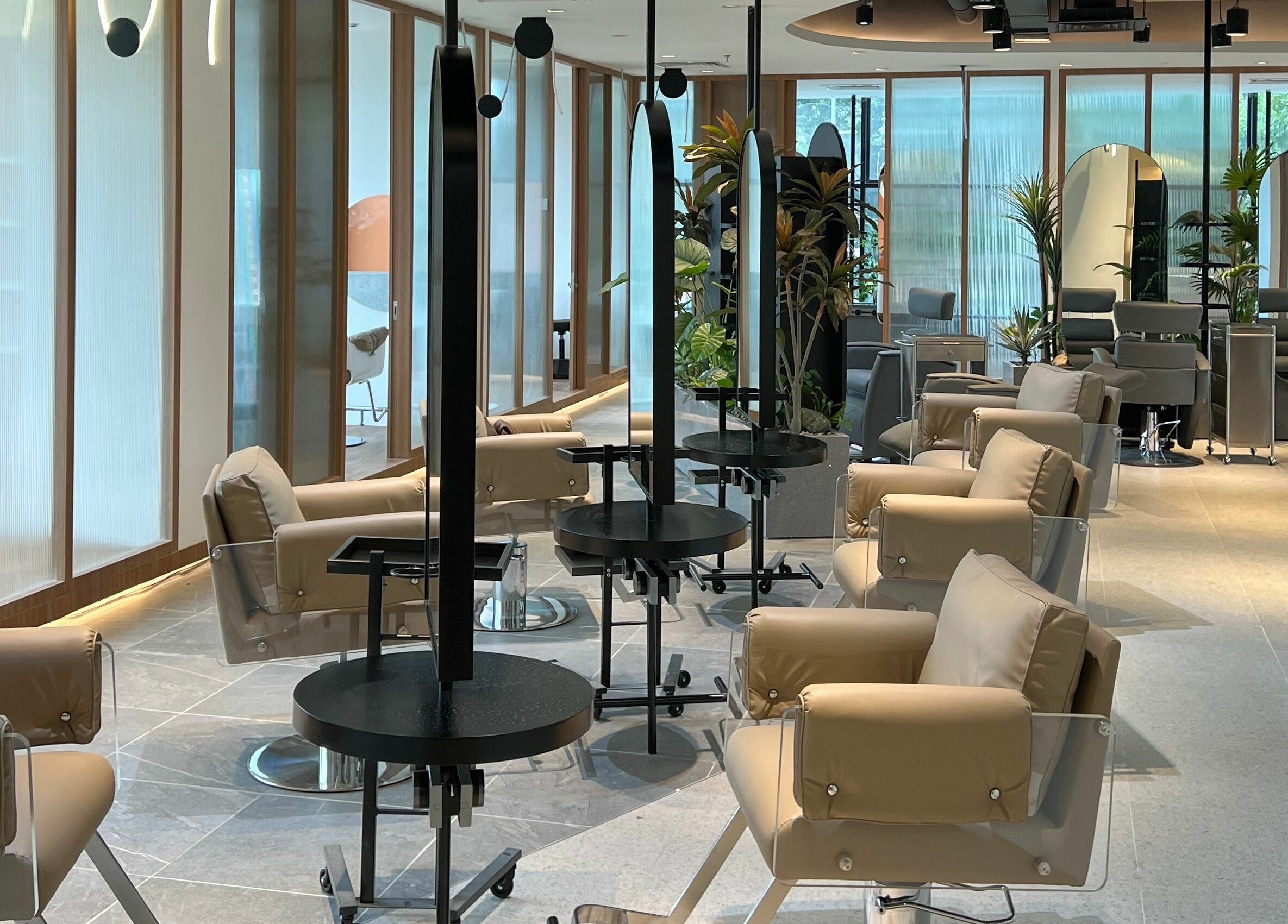 Chic and modern salon interior at Hair Library, Petaling Jaya, Selangor, MY, offering a tranquil ambiance.