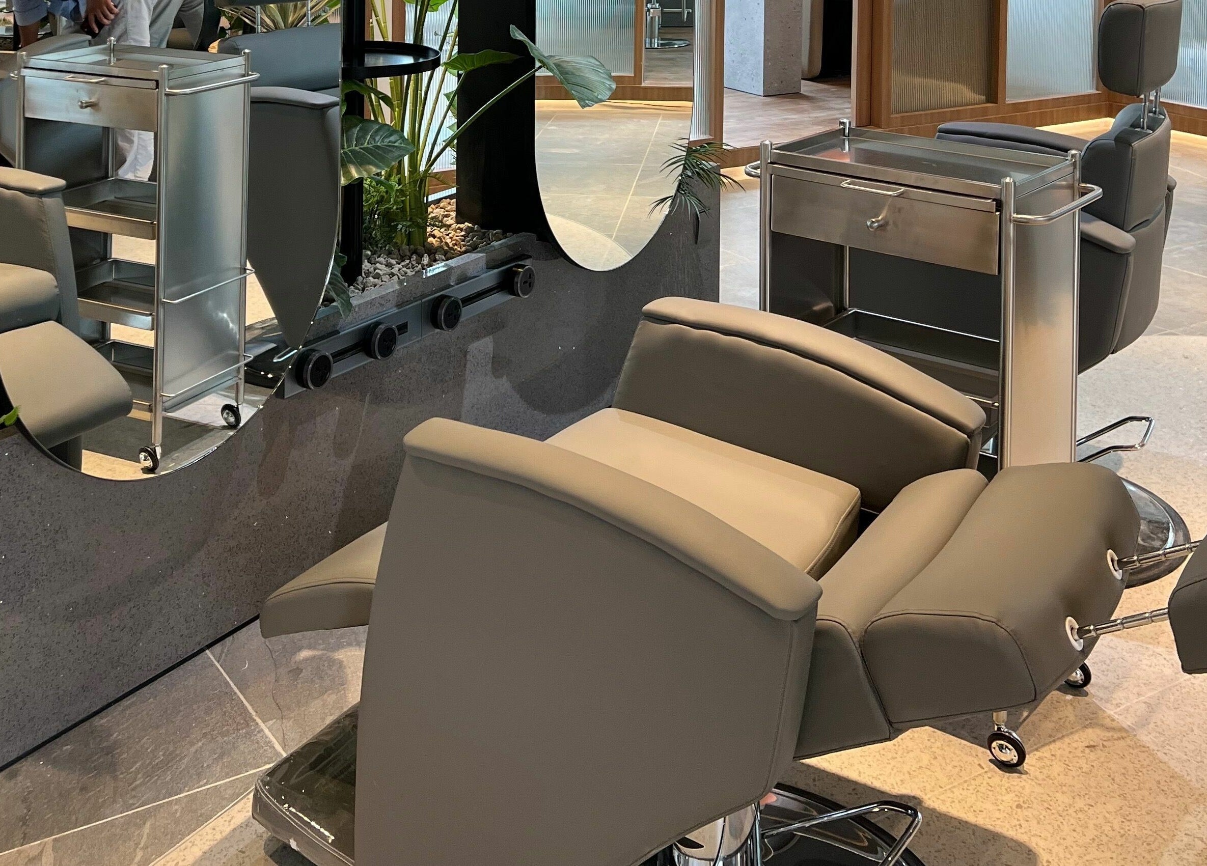 Modern salon chair and mirror setup at Hair Library, Petaling Jaya, Selangor, MY.