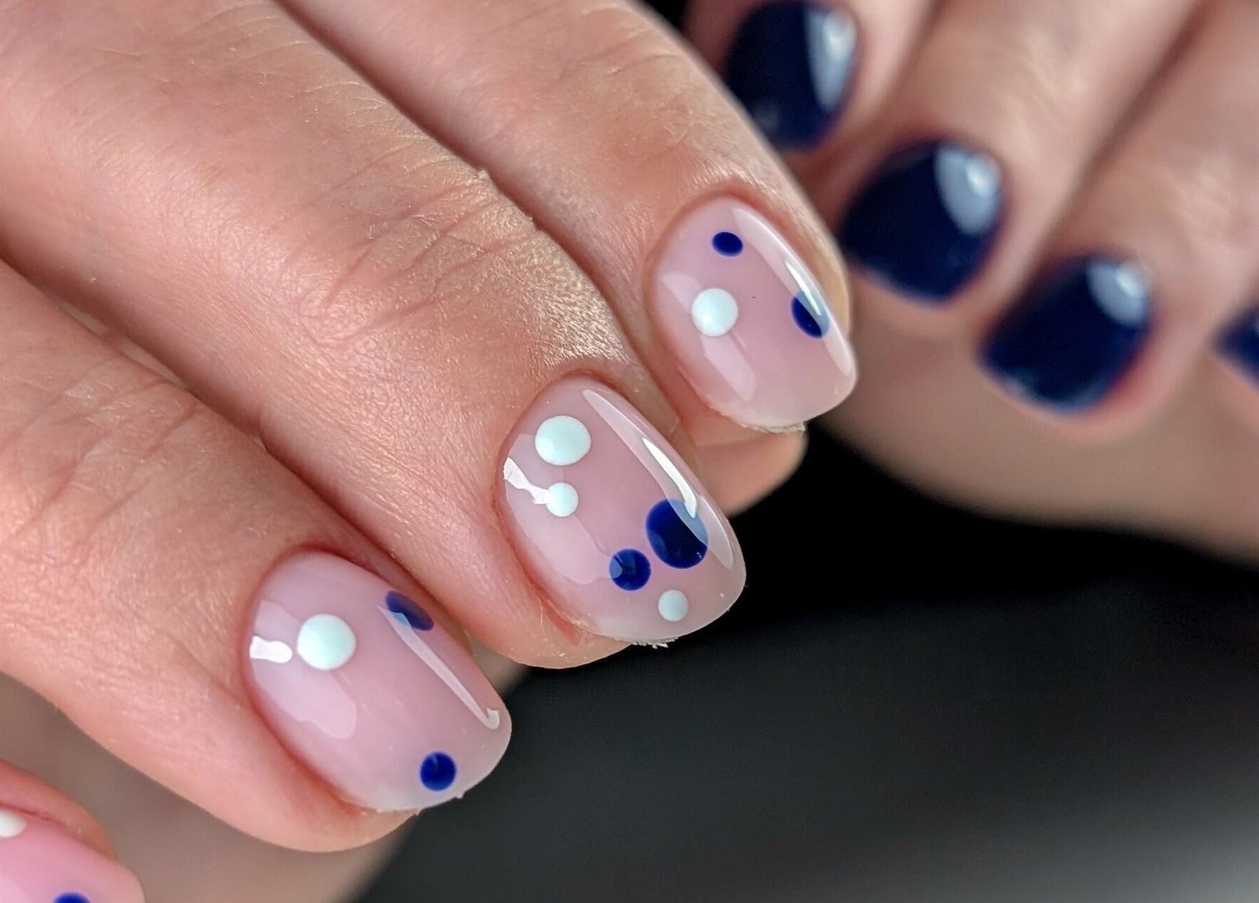 Stylish polka dot nail art at Pure&Luxe Nails, Northampton, England, GB. Perfect for a trendy look.