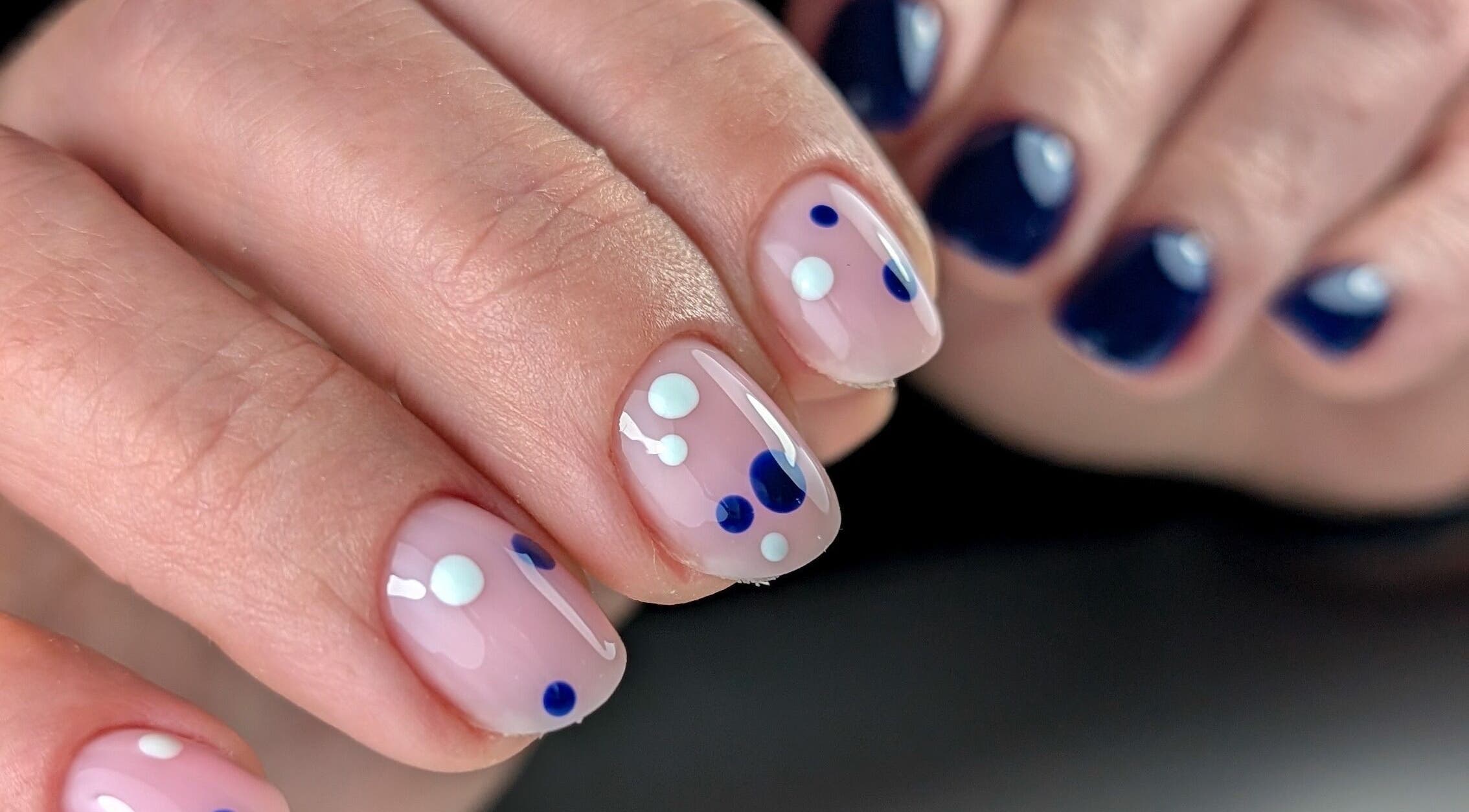 Stylish polka dot nail art at Pure&Luxe Nails, Northampton, England, GB. Perfect for a trendy look.