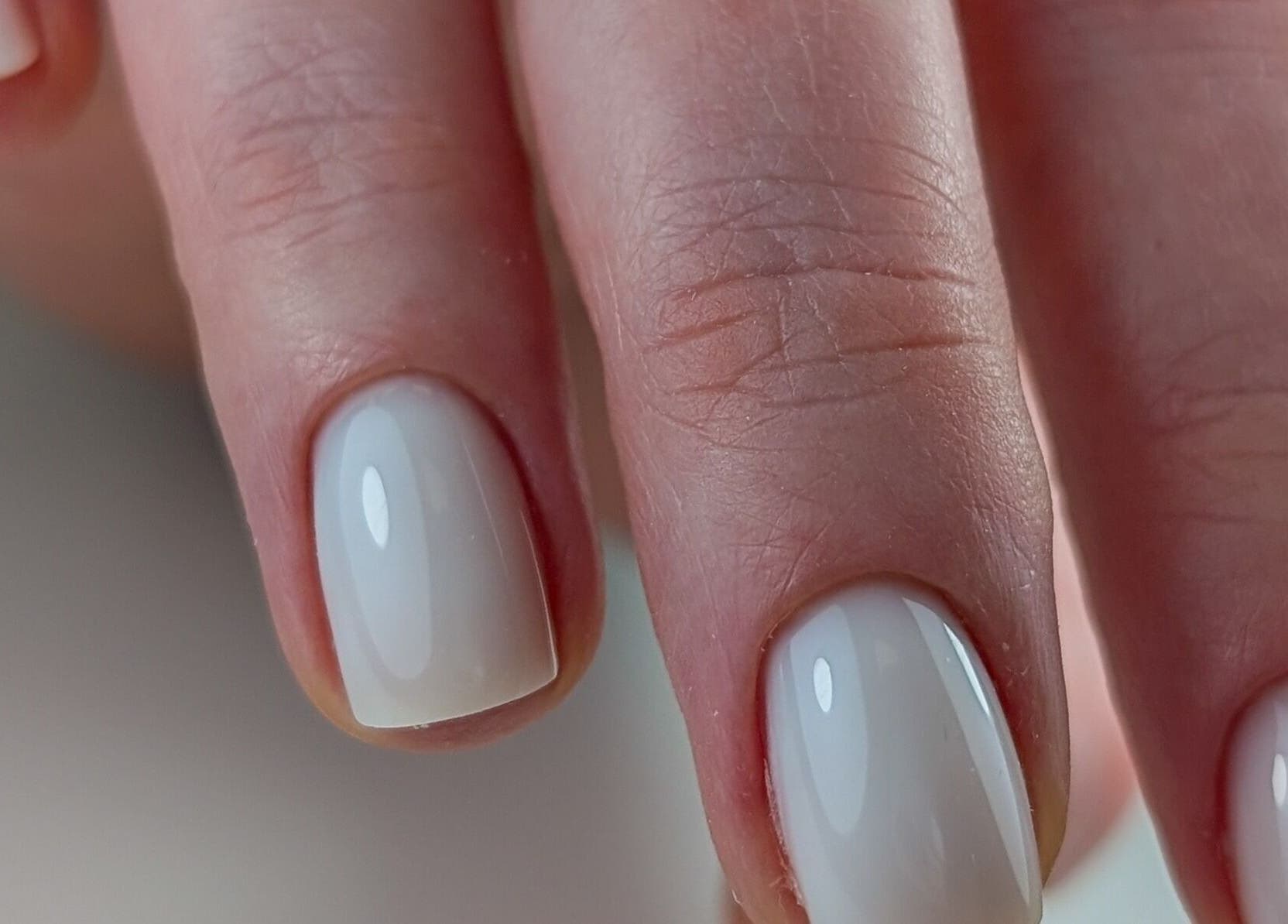 French manicure at Pure&Luxe Nails, Northampton, England, GB highlighting sophisticated nail art.