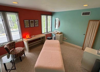 Cozy therapy room at UPTOWN Wild Crocus Holistic Therapies, Minneapolis, Minnesota, US with soothing decor.