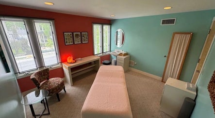 Cozy therapy room at UPTOWN Wild Crocus Holistic Therapies, Minneapolis, Minnesota, US with soothing decor.