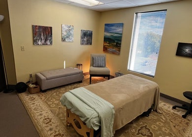 Cozy therapy room at UPTOWN Wild Crocus Holistic Therapies, Minneapolis, Minnesota with soothing decor.