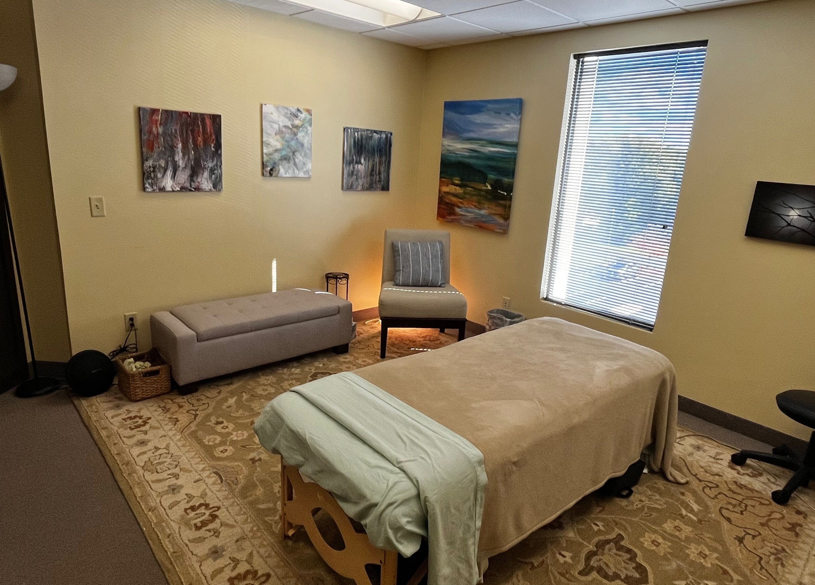 Cozy therapy room at UPTOWN Wild Crocus Holistic Therapies, Minneapolis, Minnesota with soothing decor.