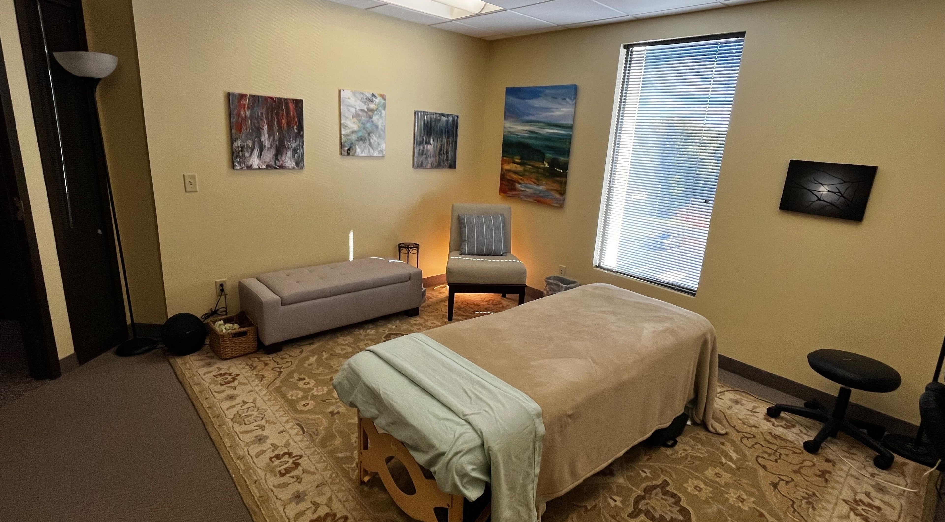 Cozy therapy room at UPTOWN Wild Crocus Holistic Therapies, Minneapolis, Minnesota with soothing decor.