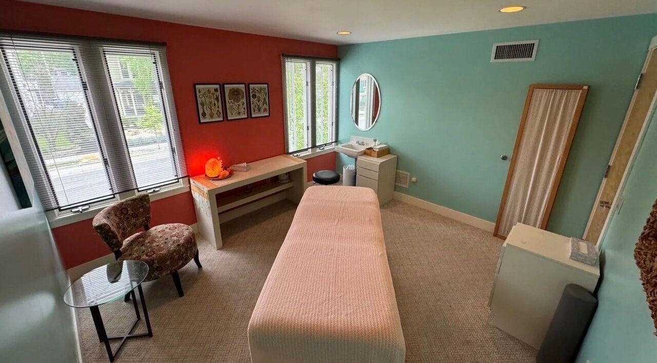 Relaxing therapy room at UPTOWN Wild Crocus Holistic Therapies in Minneapolis, Minnesota, US with cozy decor.