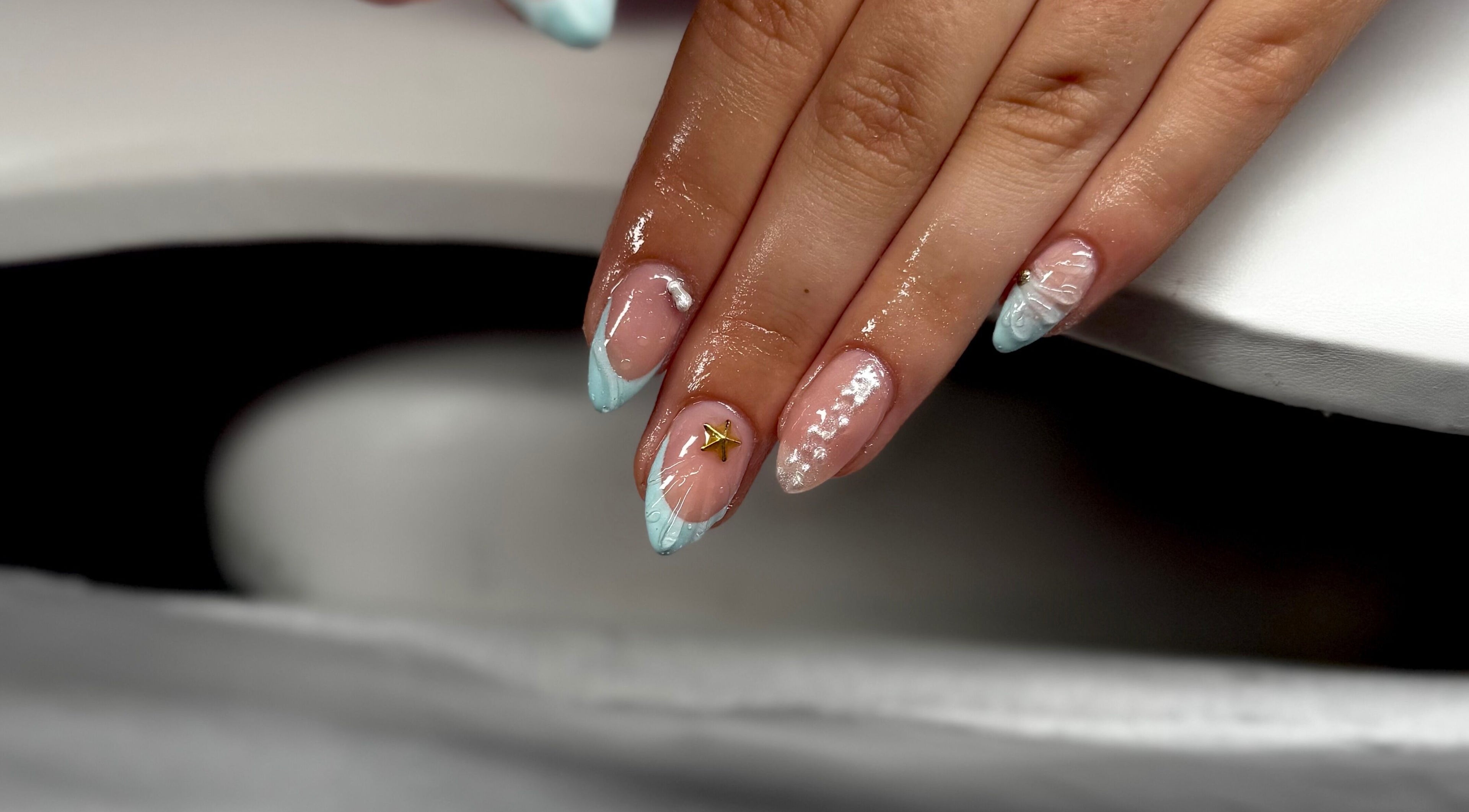 Elegant aqua nail art with gold accent at Bree Taylorr, Weymouth, England, GB.
