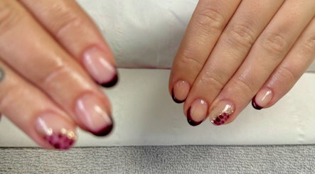Stylish nail design with dark tips at Bree Taylorr, Weymouth, England, GB, showcasing elegance.